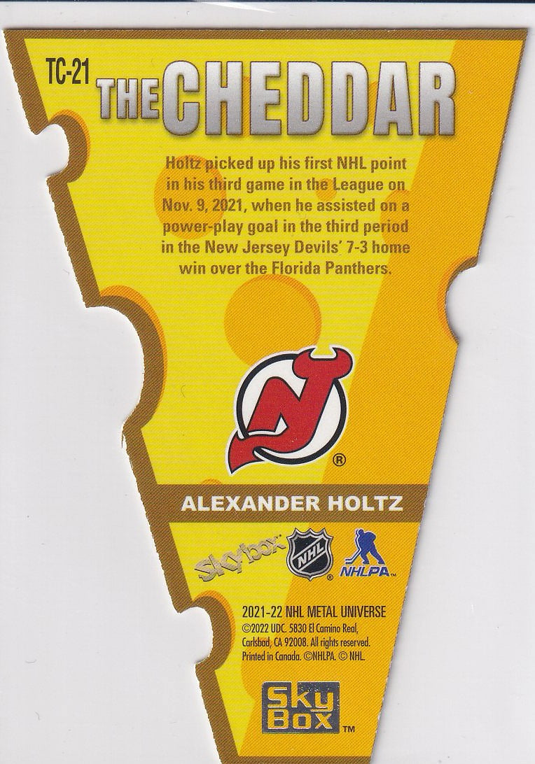 2021-22 SkyBox Metal Universe Hockey The Cheddar #TC-21 New Jersey Devils (Alexander Holtz)