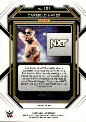 2023 Panini Prizm WWE - Base - Orange Prizm /99 #191 Carmelo Hayes