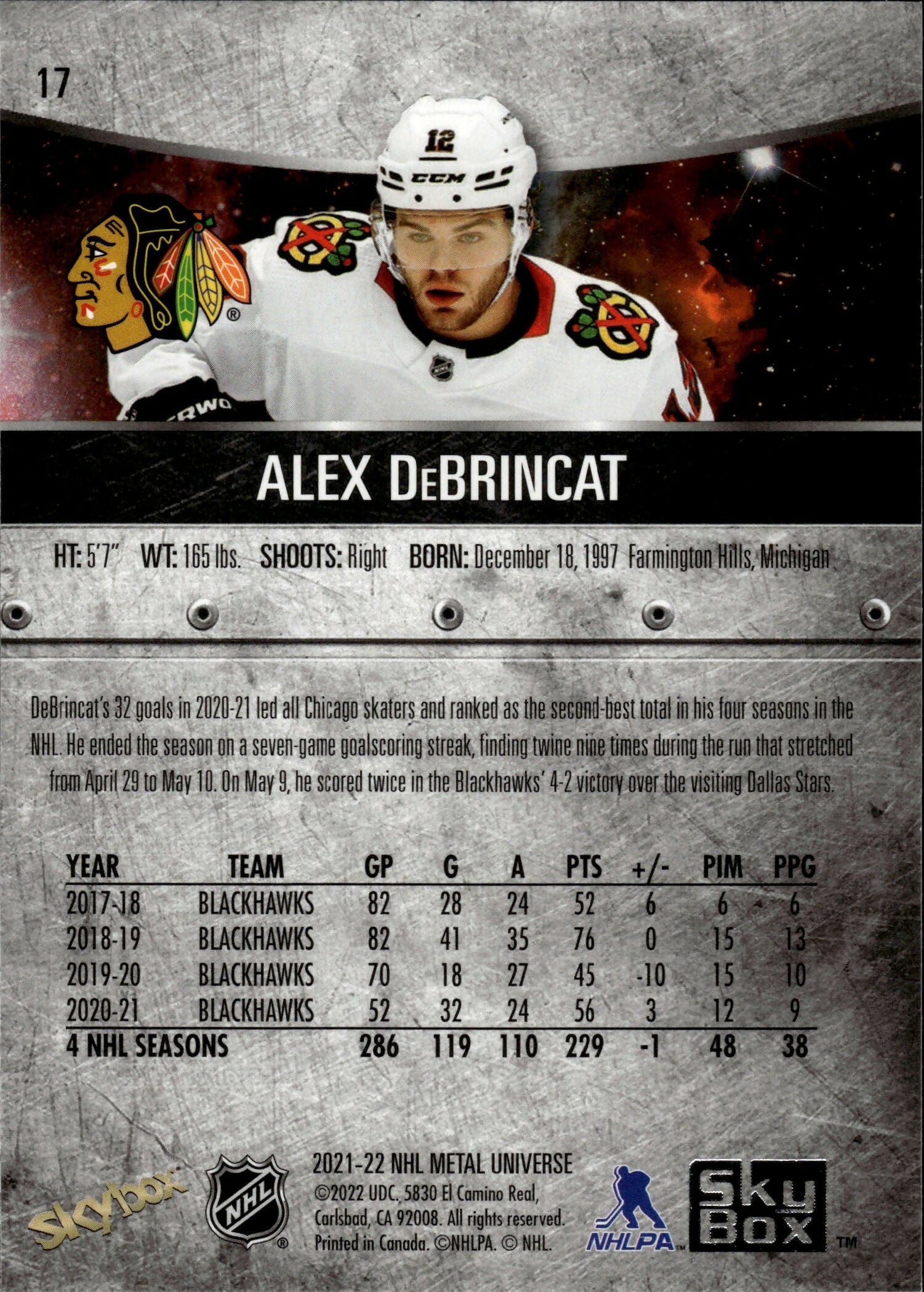 2021-22 Upper Deck Skybox Metal Universe Hockey Base #17 Alex DeBrincat - Chicago Blackhawks - B