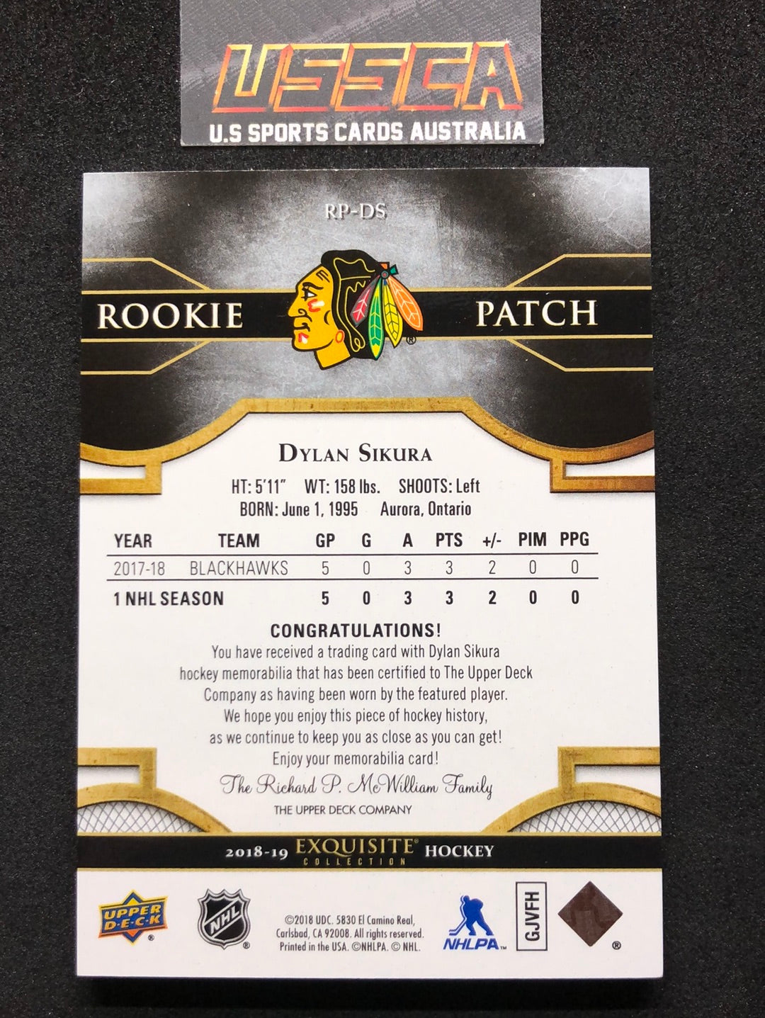 2018-19 Upper Deck Black Diamond Hockey #RP-DS - Exquisite Collection Rookie Patch 111/299 - Dylan Sikura - Chicago Blackhawks