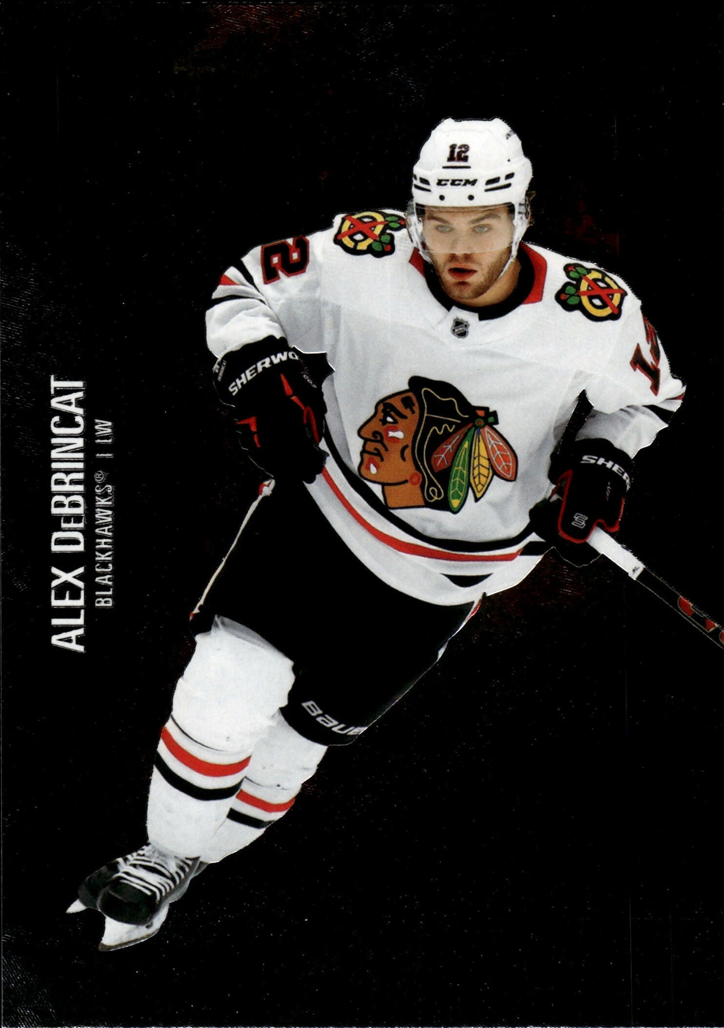 2021-22 Upper Deck Skybox Metal Universe Hockey Base #17 Alex DeBrincat - Chicago Blackhawks - A